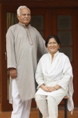 Senior couple on doorstep - Manoj Adhikari