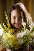 little girl smiling over bouquet of flowers - Alex Mares-Manton