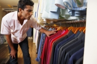 man shopping for shirts - Vivek Sharma
