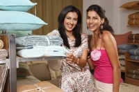 two women shopping for household items - Vivek Sharma