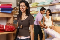 three people shopping in household store - Vivek Sharma