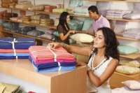 three people shopping for household items - Vivek Sharma