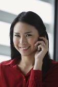 woman on cell phone, smiling - Yukmin