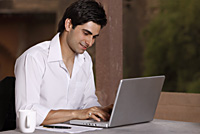 man working at laptop computer - Vivek Sharma