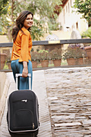 woman with luggage - Vivek Sharma