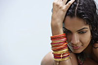 young woman wearing many bangles - Alex Mares-Manton