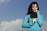 young lady holding ping pong bat - Yukmin