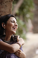 young woman in sari, big smile - Alex Mares-Manton
