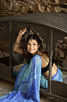 smiling young woman in sari - Alex Mares-Manton