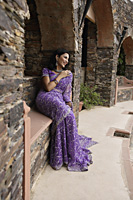 young woman in sari, sitting - Alex Mares-Manton