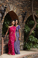 young women wearing saris - Alex Mares-Manton