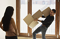 young couple moving into new home - Alex Mares-Manton