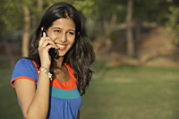 Teen girl on cell phone - Vivek Sharma