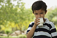boy drinking glass of milk - Vivek Sharma