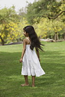 Little girl in park wearing white - Vivek Sharma