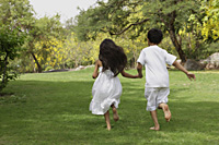 two little children running away - Vivek Sharma