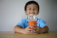 Little boy with glass of juice - Yukmin