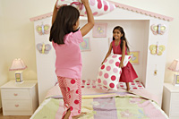 Little girls at play in their bedroom - Alex Mares-Manton