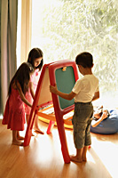 kids playing at easel - Alex Mares-Manton