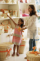 mother and daughter in toy store - Alex Mares-Manton