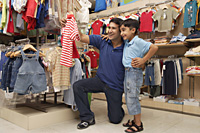 father and son shopping for clothes - Alex Mares-Manton