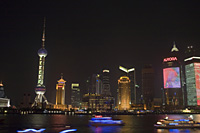 Pudong skyline from the Bund at night Shanghai, China - OTHK
