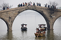 Tourists on excursion boats and on Fangsheng Bridge,  Zhujiajiao, China - OTHK