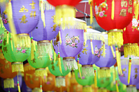 Colorful Chinese lanterns hanging in a row - Yukmin