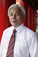 Profile of older man with white hair wearing shirt and tie - Yukmin