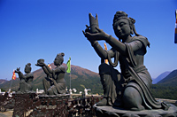 China,Hong Kong,Lantau,Chinese Goddess Statues at the Base of The Giant Buddha Statue at Po Lin Monastery - Travelasia