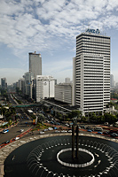 Welcome Monument and buildings along Jalan Thamrin, Jakarta - Martin Westlake