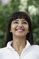 Head shot of woman looking up and smiling - Alex Mares-Manton
