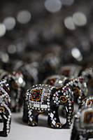 Elephant figurines decorated with mirrors and beads - Alex Mares-Manton