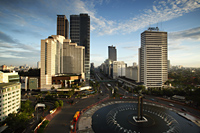 View of the Hotel Indonesia roundabout, Welcome Monument and buildings along Jalan Thamrin, Jakarta - Martin Westlake