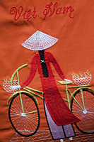 Vietnam,Vietnam,Ho Chi Minh City,Artwork on Souvenir Handbag - Travelasia