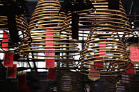 incense coils hanging from ceiling. Man Mo Temple, Hong Kong - Alex Mares-Manton