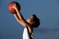 Young boy catching basket ball - Yukmin