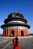 Temple of Heaven or Tiantan,Girl Taking Photo of Hall of Prayer for Good Harvests. Beijing, China - Travelasia