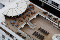 Arial view of a yacht with deck chairs - Yukmin