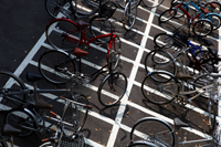Bicycles parked in lot. Japan - Yukmin