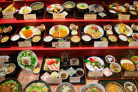 Display of plastic food in front of restaurant. Tokyo, Japan - Travelasia