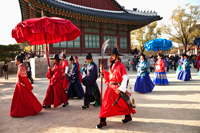 Gyeongbokgung Palace, Re-enactment of the King and Queen Strolling in the Palace Grounds. Korea - Travelasia