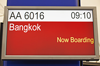 Airport departure sign for Bangkok, Hong Kong Airport. - Travelasia