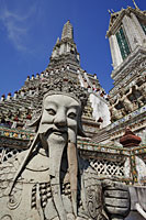 Stone statue in front of Wat Arun,Temple of Dawn, Thailand,Bangkok - Travelasia