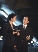 Two executives talking at night - Jade Lee