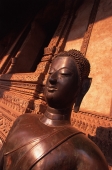 Laos, Vientiane, Buddha statue in the corridor of Wat Phra Keo - John McDermott