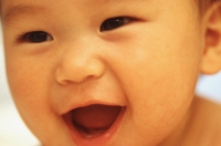 Baby boy (3 - 9 months old), laughing, close up - Keith Brofsky