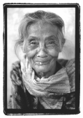 Mature woman wearing scarf, portrait - Mary Grace Long