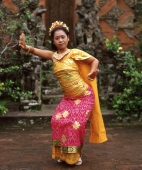 Indonesia, Bali, woman in traditional balinese dance dress. - Jack Hollingsworth