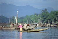 Vietnam, near Hue, fishing boats on Perfume River. - Steve Raymer